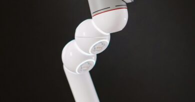 Close-up of a futuristic articulated robot arm highlighting innovation and technology.