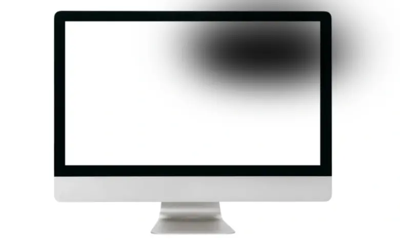 shadow on computer monitor